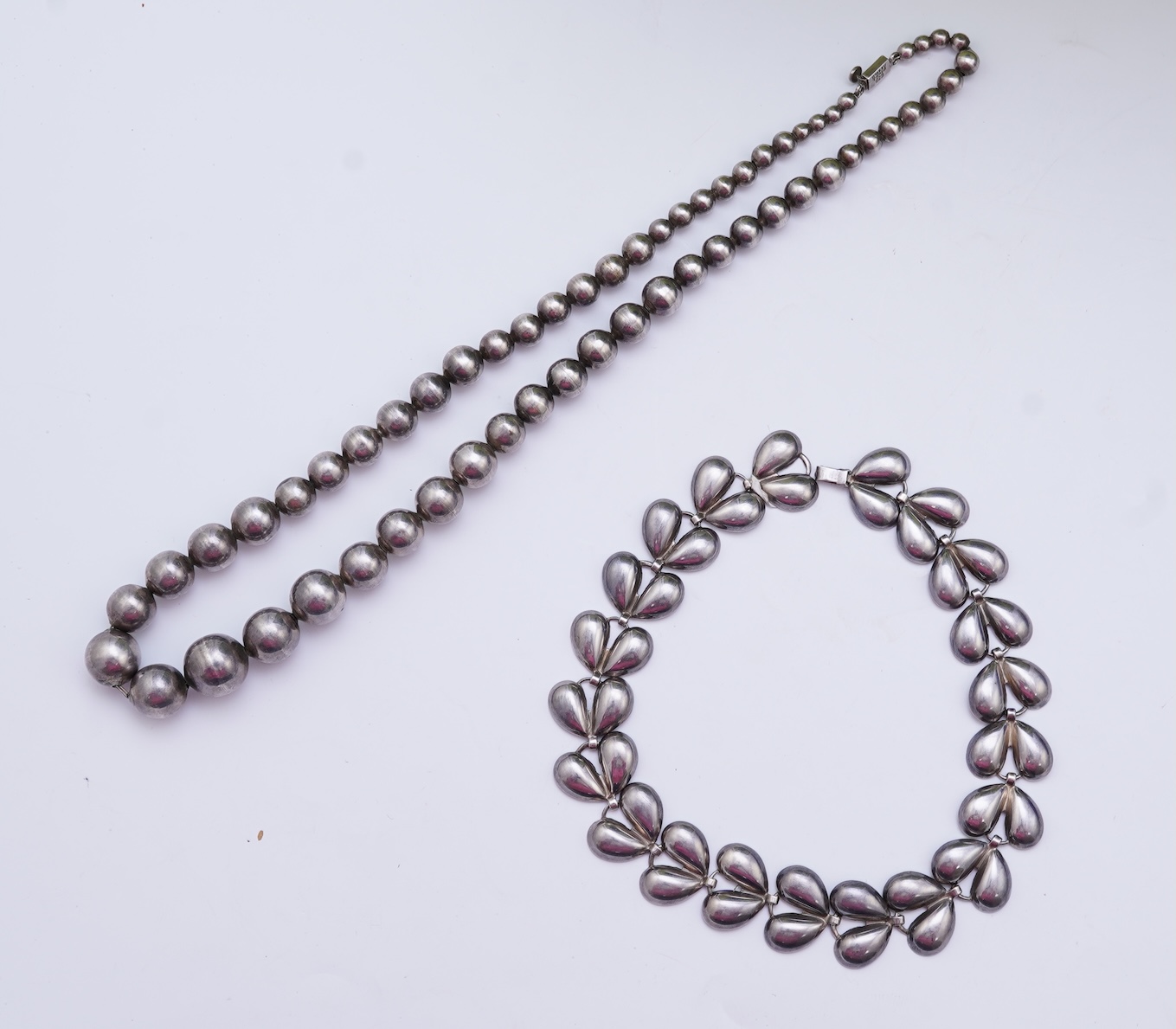 Two silver necklaces